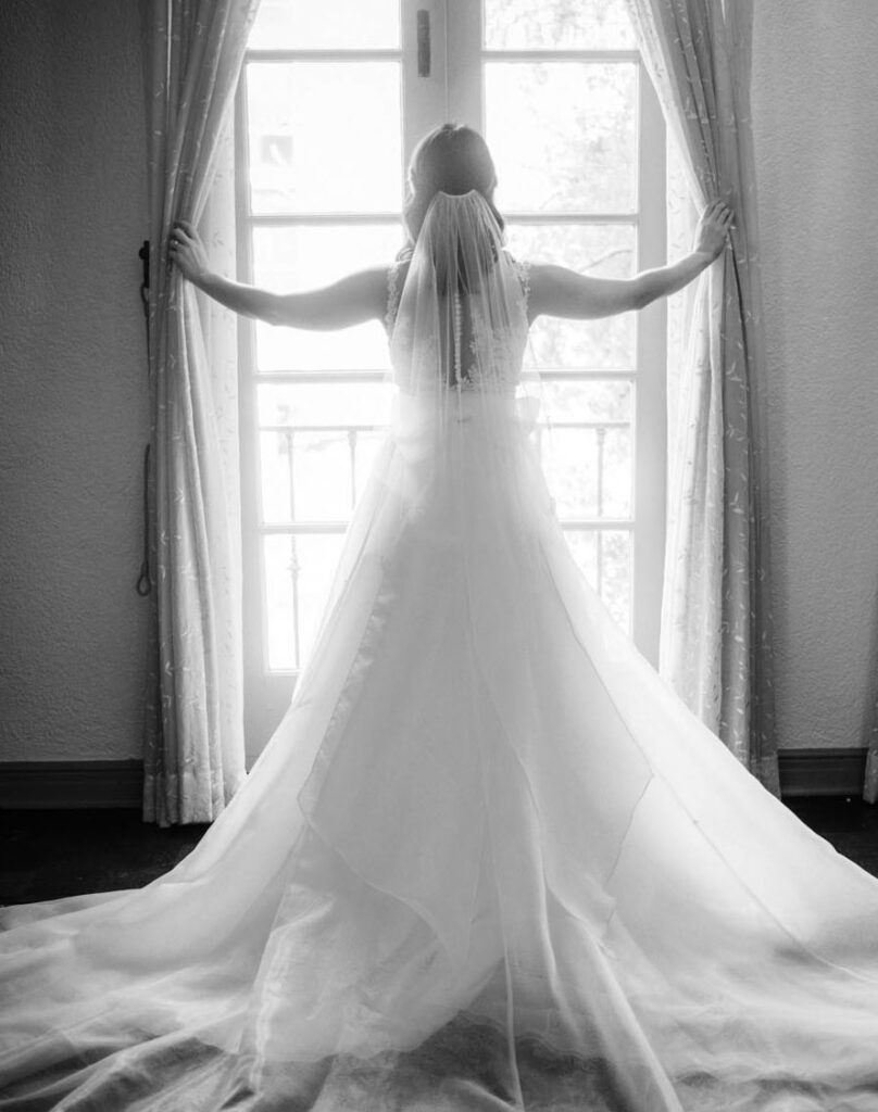 Bride facing window