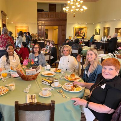 table at breakfast with Ebell members and scholars